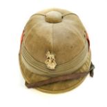 A WWII SOUTH AFRICAN STAFF COLONEL'S POLO PITH HELMET Complete with badge and side flashes,