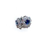 A PAIR OF SAPPHIRE EARRINGS claw set to the centre with two round brilliant cut sapphires weighing