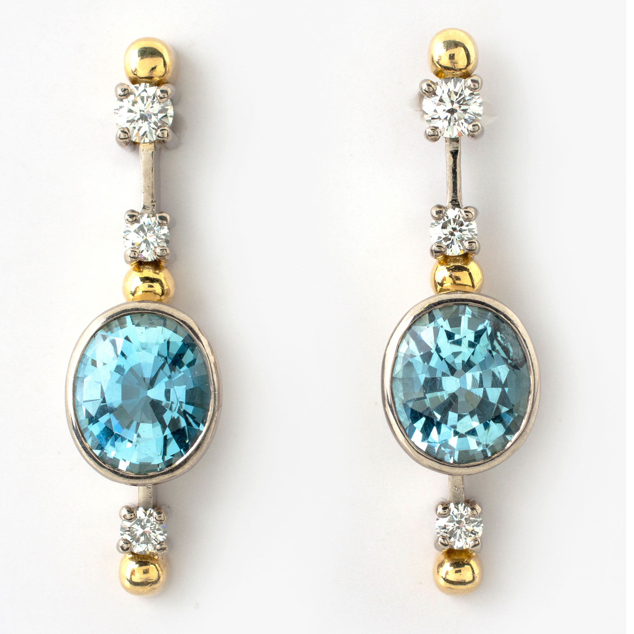 A PAIR OF DIAMOND AND AQUAMARINE EARRINGS