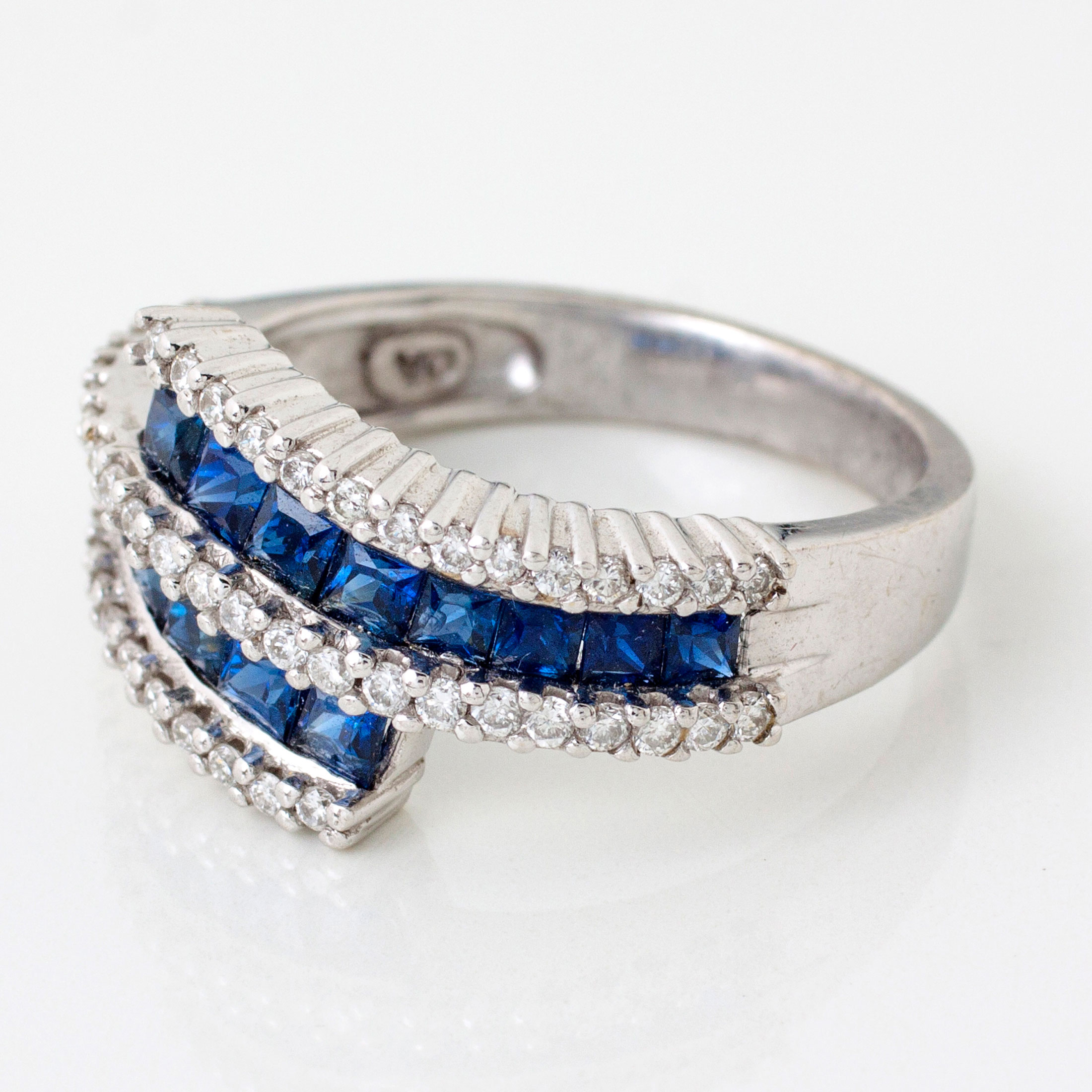 A DIAMOND AND SAPPHIRE CROSSOVER RING - Image 2 of 2