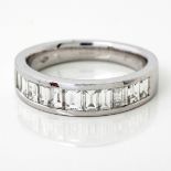 A DIAMOND HALF ETERNITY RING