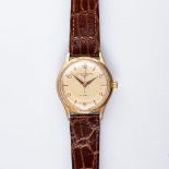 A GENTLEMAN'S 9CT GOLD WRISTWATCH, BAUME AND MERCIER