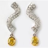 A PAIR OF DIAMOND EARRINGS