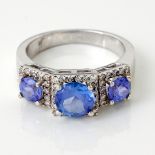 A DIAMOND AND TANZANITE RING