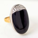 A DIAMOND AND ONYX RING