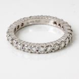 A DIAMOND ETERNITY RING, BROWNS