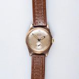 A GENTLEMAN'S 9CT GOLD WRISTWATCH, CYMA DELUXE