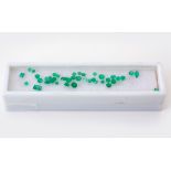 A COLLECTION OF UNMOUNTED MIXED-CUT NATURAL EMERALDS