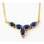 A SAPPHIRE AND DIAMOND NECKLACE