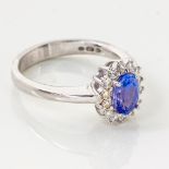 A DIAMOND AND TANZANITE RING