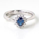 A DIAMOND AND SAPPHIRE RING, BROWNS