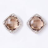 A PAIR OF DIAMOND AND SMOKY QUARTZ EARRINGS