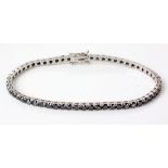 A BLACK DIAMOND TENNIS BRACELET