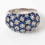 A DIAMOND AND SAPPHIRE BOMBE RING