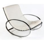 AN ELLIPSE ARMCHAIR, DESIGNED BY RENATO ZEVI