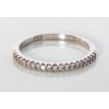 A DIAMOND HALF-ETERNITY RING