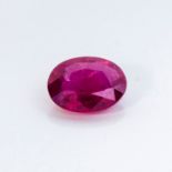 AN UNMOUNTED OVAL MIXED-CUT RUBY