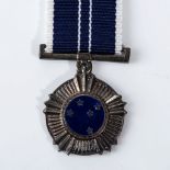 A SOUTHERN CROSS MINIATURE MEDAL