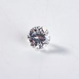 AN UNMOUNTED ROUND BRILLIANT-CUT DIAMOND