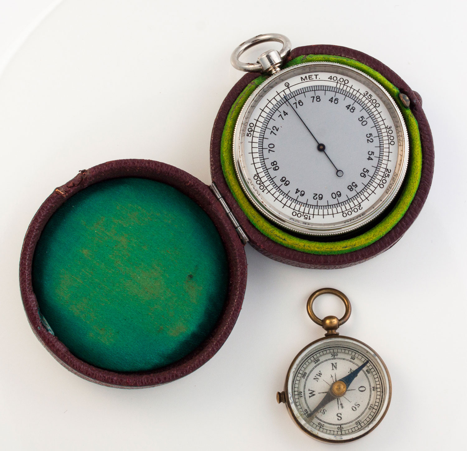 A CASED POCKET BAROMETER