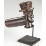 A FIGURATIVE PIPE OF A MAN WEARING A TOP HAT, DRC