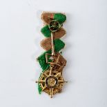 A SOUTH VIETNAM DSO MINIATURE MEDAL, VIETNAM WAR