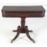 A REGENCY MAHOGANY TEA TABLE