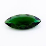 AN UNMOUNTED MARQUISE-CUT GREEN TOURMALINE