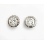 A PAIR OF DIAMOND EAR STUDS