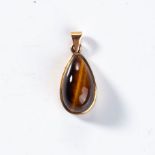 A TIGER'S EYE PENDANT