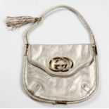 A GUCCI BRITT SMALL TASSEL HOBO BAG