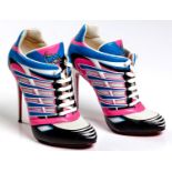 A PAIR OF CHRISTIAN LOUBOUTIN BOLTINA SNEAKERS