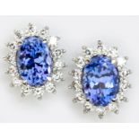 A PAIR OF TANZANITE AND DIAMOND CLUSTER EARRINGS