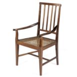 A CAPE STINKWOOD NEOCLASSICAL ARMCHAIR
