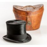 A LEATHER-CASED SILK TOP HAT, HENRY HEATH, 1920