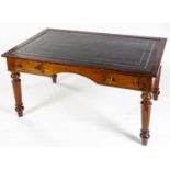 A VICTORIAN MAHOGANY WRITING TABLE