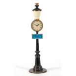 A GILT-METAL AND BLACK LACQUERED JAEGER-LECOULTRE RUE DE LA PAIX LAMP POST CLOCK