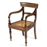 A CAPE STINKWOOD REGENCY ARMCHAIR