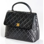 A LIMITED-EDITION CHANEL KELLY BAG