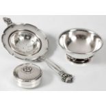 A SILVER ACORN PATTERN TEA STRAINER BY GEORG JENSEN