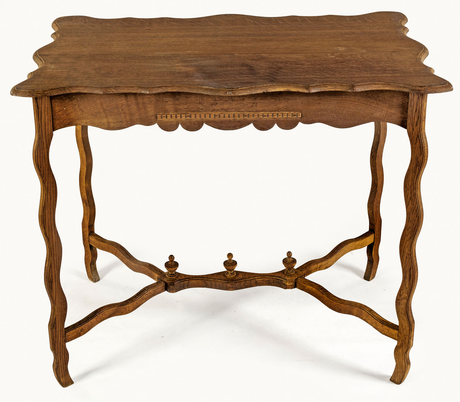 A CONTINENTAL OAK TABLE