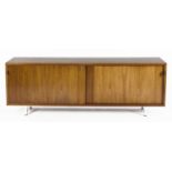 A WALNUT 116 SIDEBOARD, DESIGNED BY FLORENCE KNOLL AND MANUFACTURED BY KNOLL, 1952