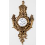 AN ORMOLU WALL CLOCK