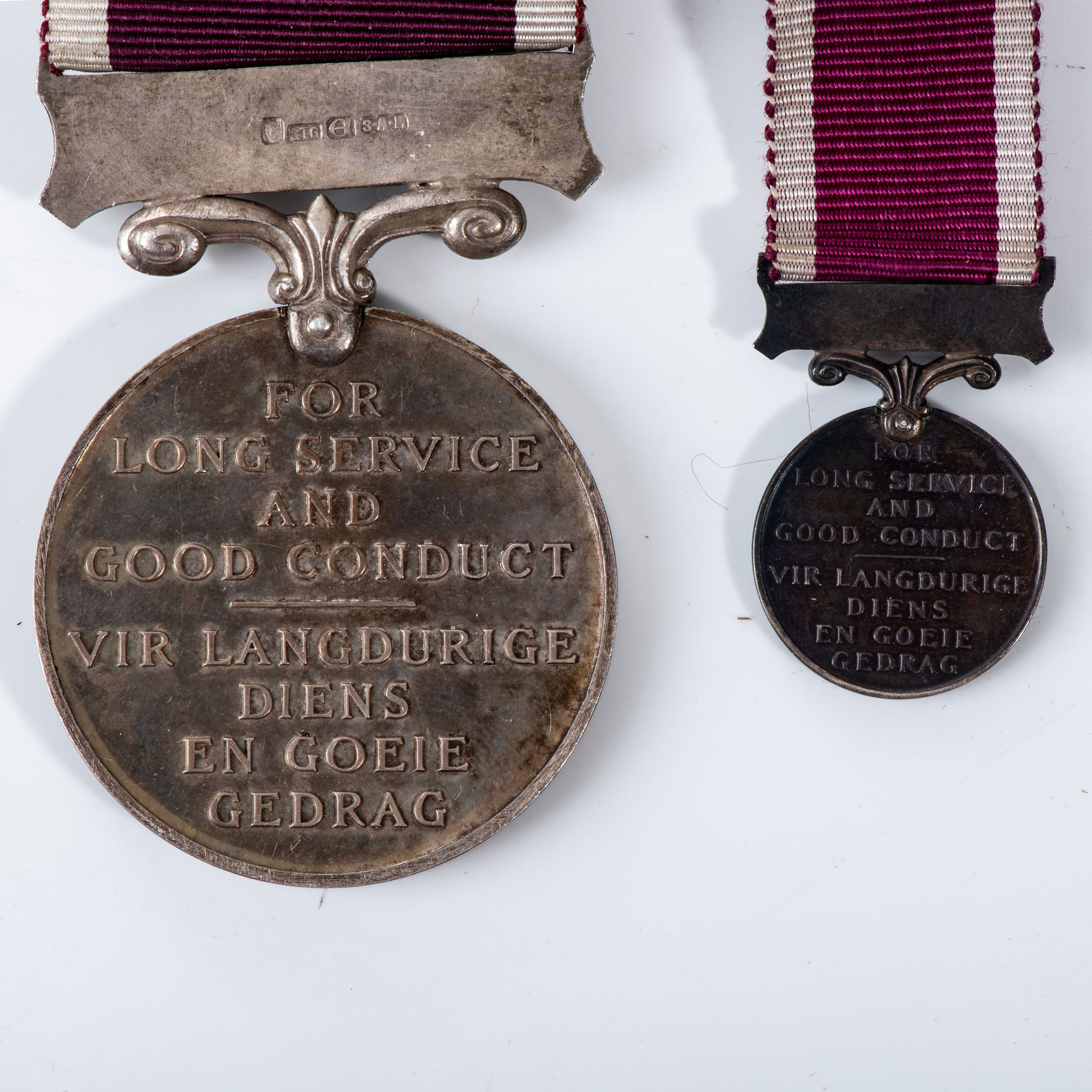 A SOUTH AFRICAN PERMANENT FORCE LONG SERVICE AND GOOD CONDUCT MEDAL WITH MINIATURE - Image 2 of 2