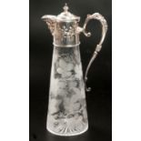 A SILVER-MOUNTED CUT-GLASS CLARET JUG