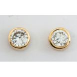 A PAIR OF DIAMOND EAR STUDS, UWE KOETTER Each bezel set with a round brilliant-cut diamond