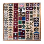 A FRAMED COLLECTION OF BRITISH AIRBORNE BADGES WWII