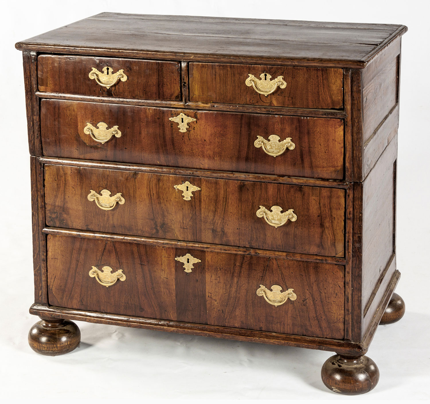 AN OAK AND DEAL CHEST-OF-DRAWERS, 18TH CENTURY