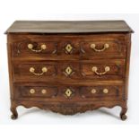 A FRENCH OAK CHEST-OF-DRAWERS, 19TH CENTURY