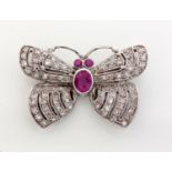 A DIAMOND AND PINK SAPPHIRE BROOCH